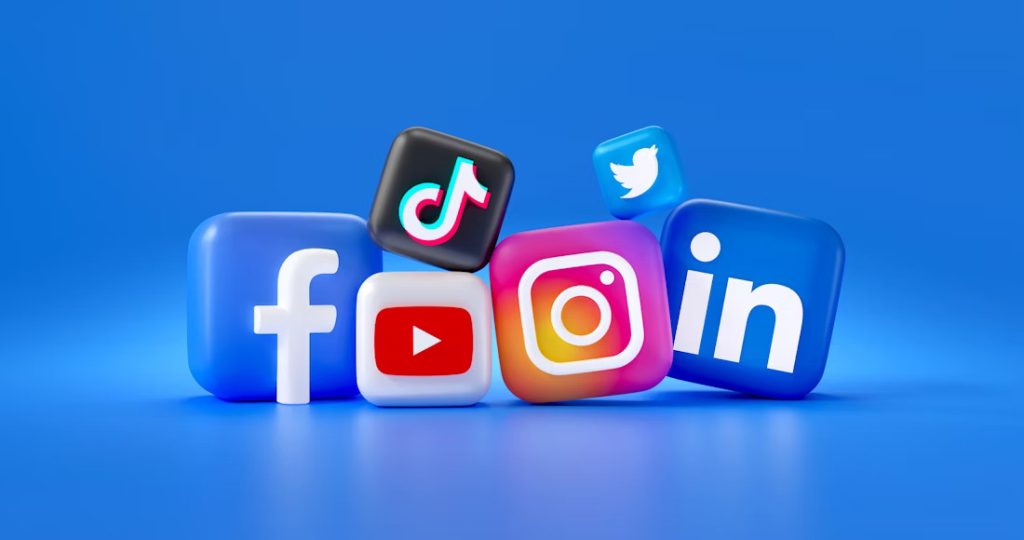 3D rendered social media icons for Facebook, TikTok, Instagram, YouTube, and LinkedIn against a blue background.